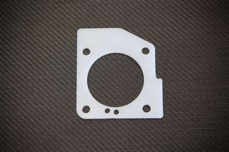 Torque Solution Thermal Throttle Body Gasket: DSM Eclipse / Talon 2nd Gen 4G63 Turbo Only - TS-TBG-013