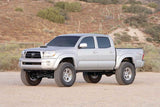 Fabtech 05-14 Toyota Tacoma 4WD/2WD 6 Lug 6in Perf. System w/DL 2.5 Resi Coilovers & Rear DL Shocks - K7039DL
