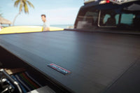 Roll-N-Lock 15-17 Ford F-150 65-5/8in E-Series Retractable Tonneau Cover - RC101E