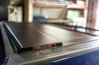 Roll-N-Lock 15-17 Chevy Silverado/Sierra 2500/3500 77-3/8in E-Series Retractable Tonneau Cover - RC221E