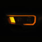 ANZO 2016-2017 Toyota Tacoma Projector Headlights w/ Plank Style Switchback Black w/ Amber w/ DRL - 111397