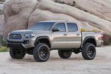 Fabtech 16-19 Toyota Tacoma 4WD/2WD 6 Lug 6in Perf. System w/DL 2.5 Coilovers & Rear DL Resi Shocks - K7049DL