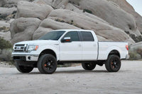 Fabtech 09-13 Ford F150 4WD 4in Perf. System w/DL 2.5 Resi Coilovers & Rear DL Shocks - K2198DL